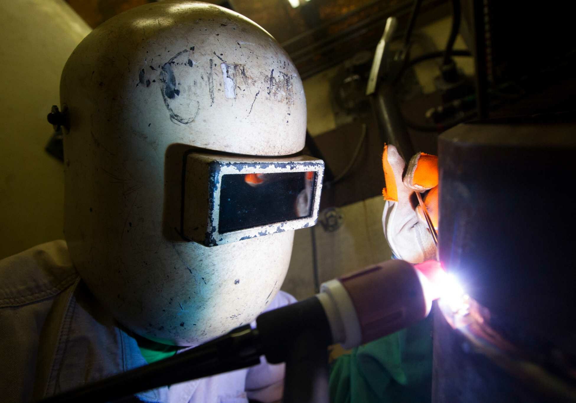 Fluor employee and student Francisco Chavez-Perez practices his wielding skills on Wednesday, Oct. 15, 2014, in Oyster Creek. (J. Patric Schneider / For the Chronicle )